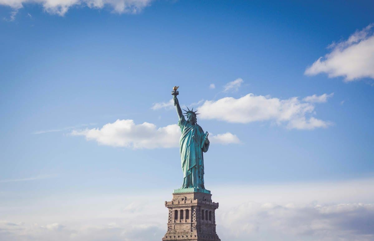 The Statue of Liberty against a blue sky